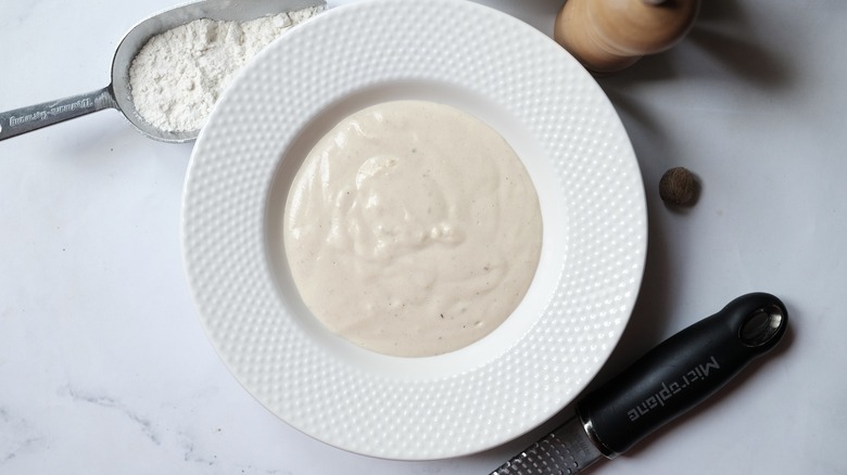 béchamel sauce in a bowl 