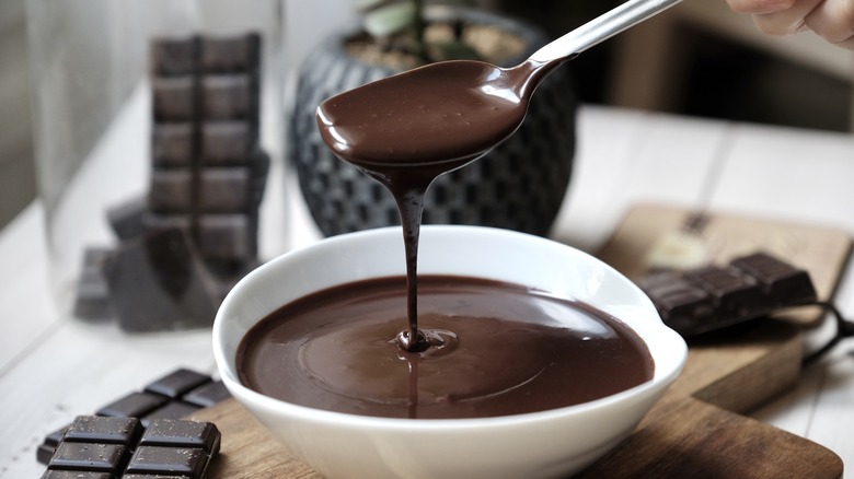 chocolate drizzling into bowl