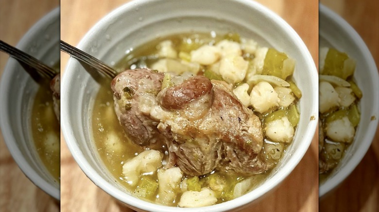 Bowl of lamb stew with green chiles