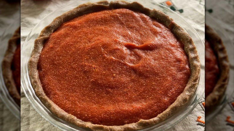persimmon pie in a glass dish