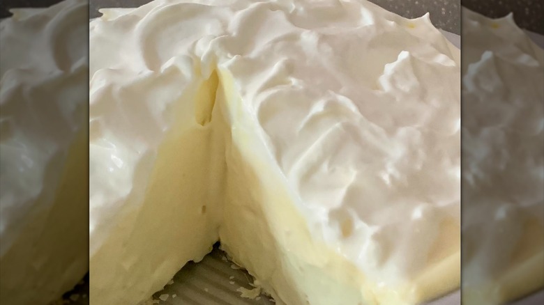 Fluffly lemon chiffon pie with slice cut out