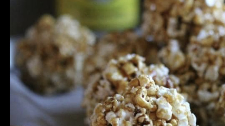 Tac-tac popcorn balls on baking sheet
