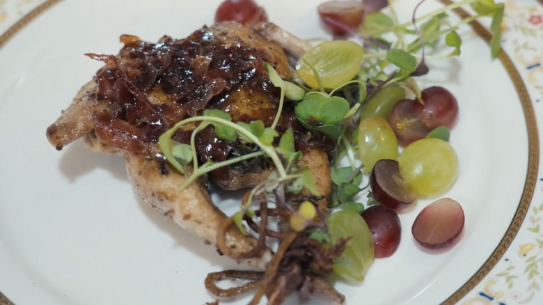 Roasted quail with bacon and grapes