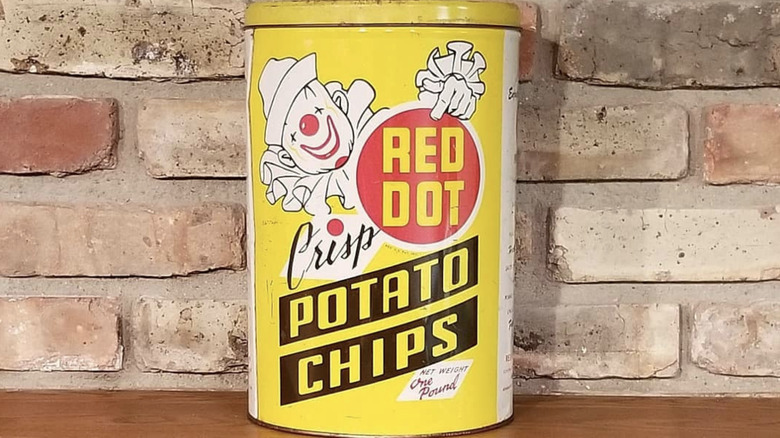 Yellow metal can of Red Dot potato chips