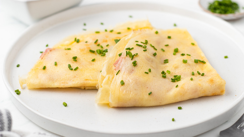 cheese and ham crepes on plate