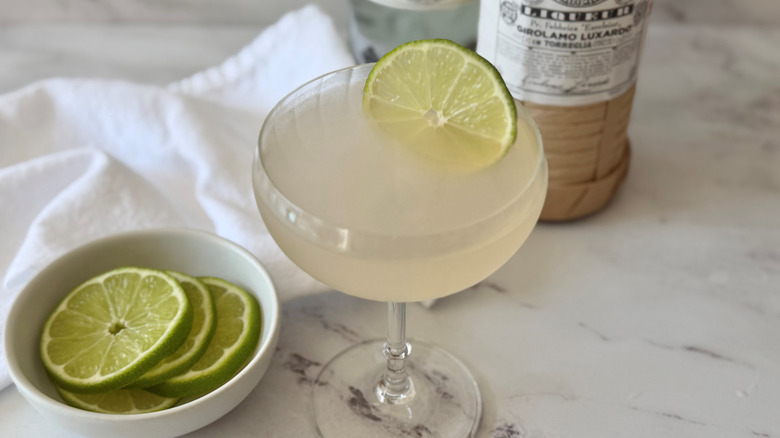 Hemingway daiquiri served in coupe glass with lime wheel