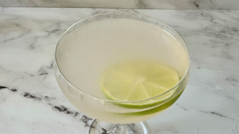 Hemingway daiquiri in coupe glass with lime wheel