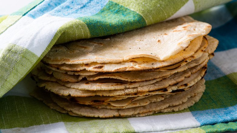 corn tortillas in kitchen towel