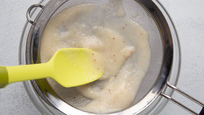straining peach puree
