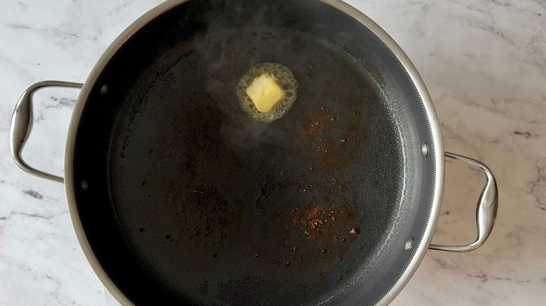 Butter melting in skillet