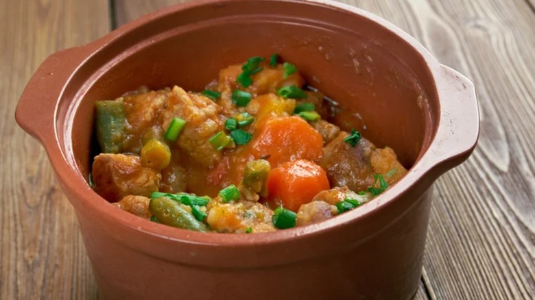 bowl of stew with carrots and meat