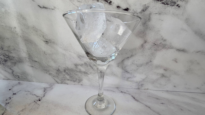 Martini glass filled with ice