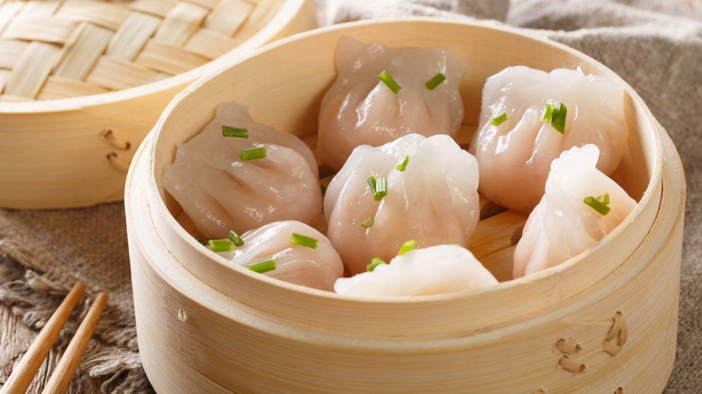 bamboo steamer basket with dumplings