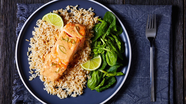 Salmon on brown rice with greens