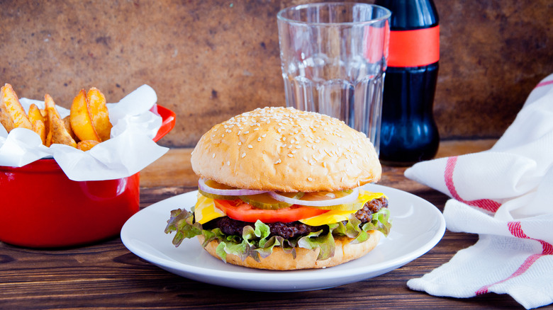 burger with fries and Coca-Cola