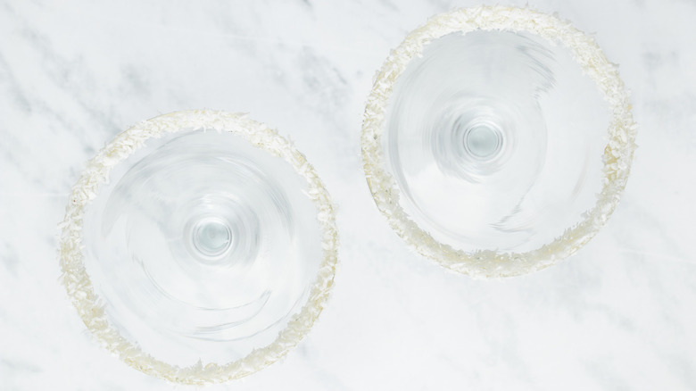 empty coconut-rimmed martini glasses