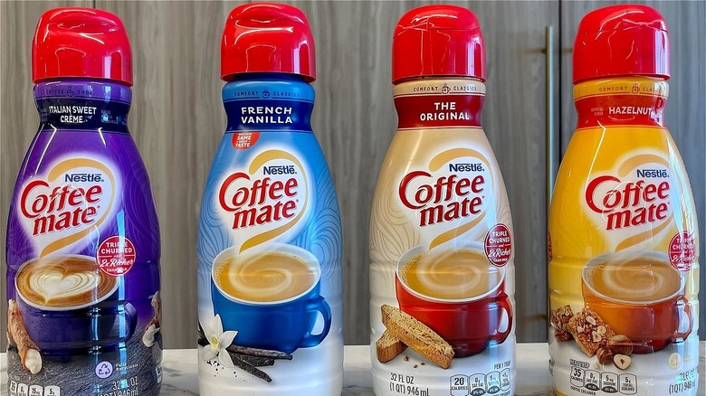 Four Coffee Mate bottles