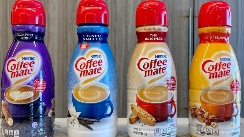 four bottles of coffee mate creamer