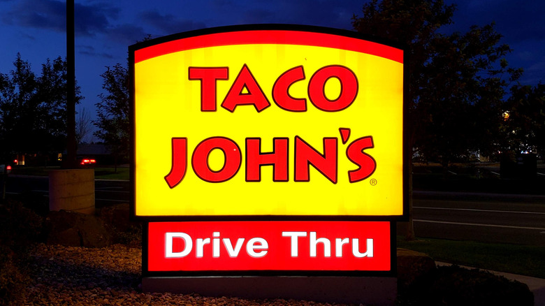 Taco John's sign at night