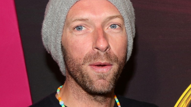 Closeup of Chris Martin in knit hat