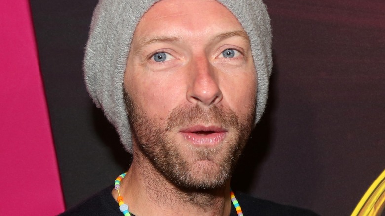 Closeup of Chris Martin in knit hat