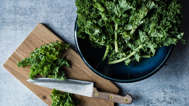 kale and a chopping board