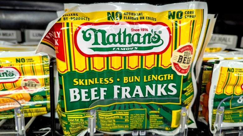 Nathan's skinless beef franks in a package on a store shelf