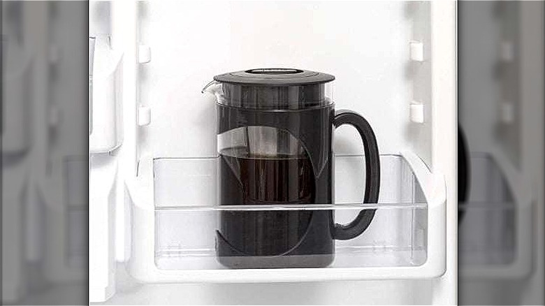Black Primula Burke cold brew coffee maker with coffee in fridge
