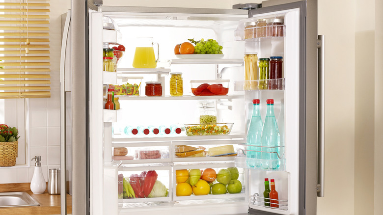 A French door fridge with the top doors open