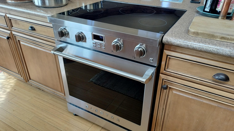 An Electra induction stove installed inside a kitchen.