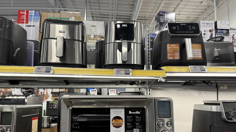 Air fryers on display on store shelf
