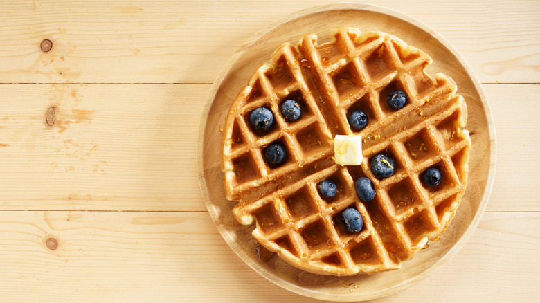 A waffle with blueberries