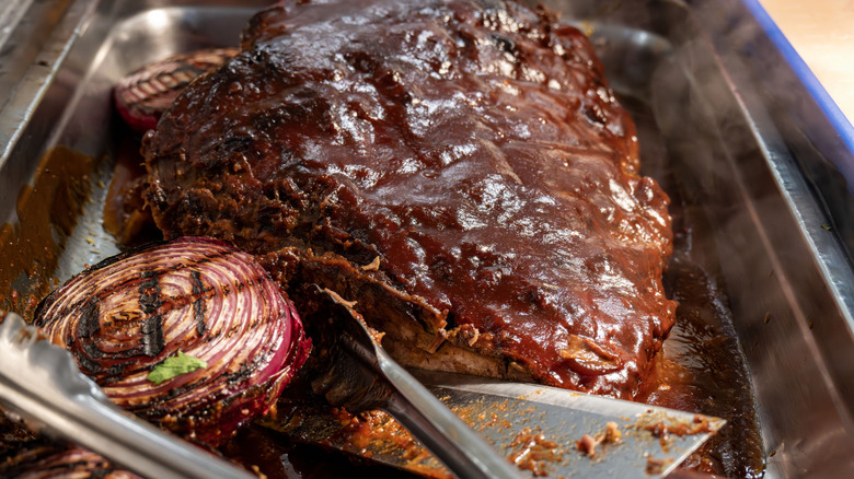 Brisket and onion in pan