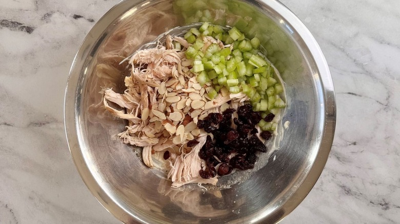 Chicken salad ingredients unmixed in bowl