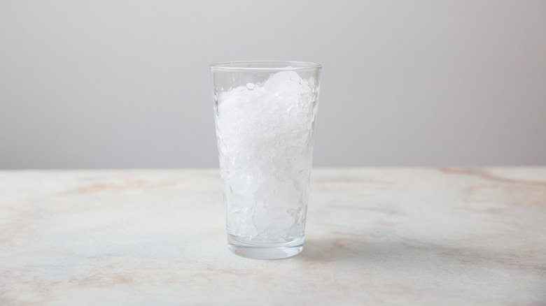 glass of ice on table
