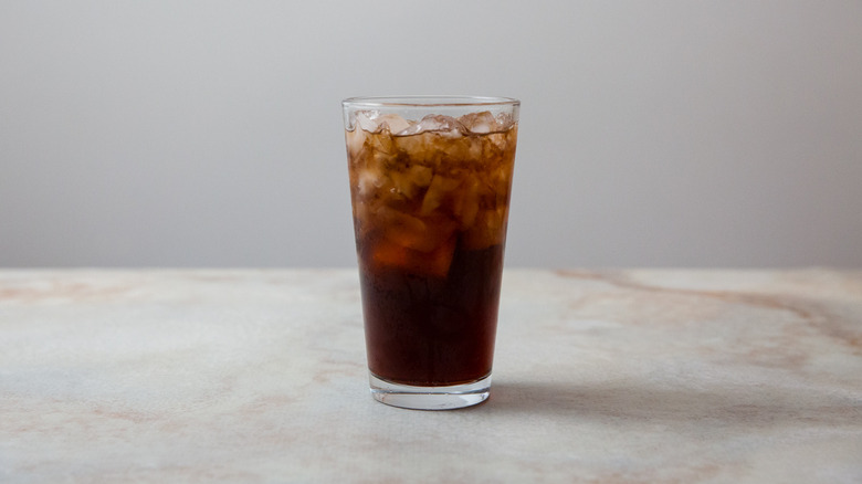 glass of cola on table