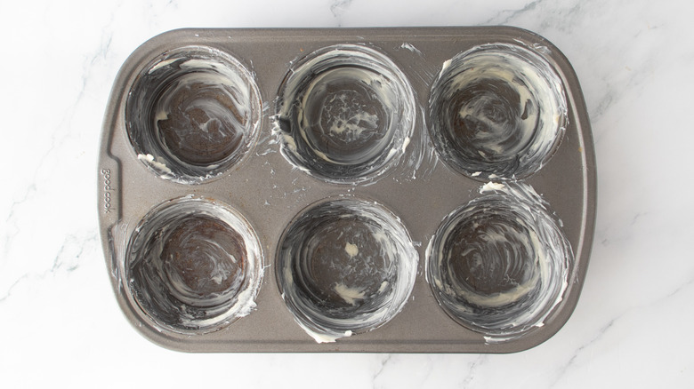 greased muffin pan