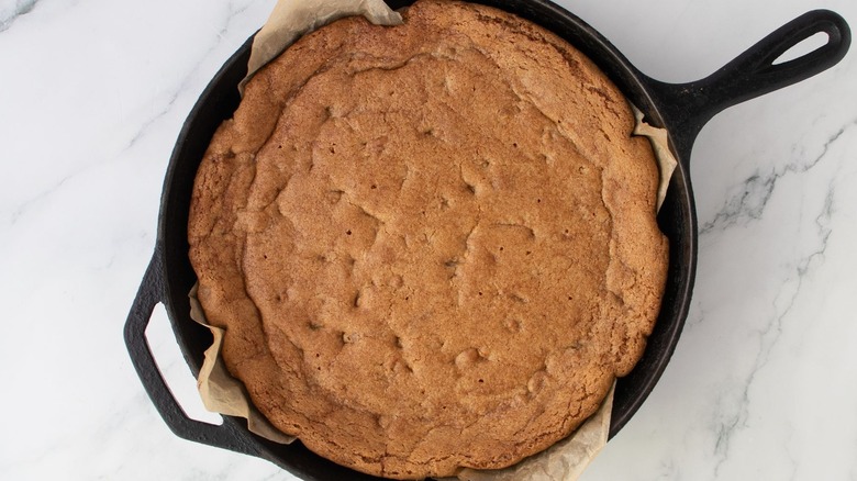 Baked cookie pizza in skillet