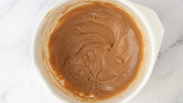 Peanut butter sauce in mixing bowl