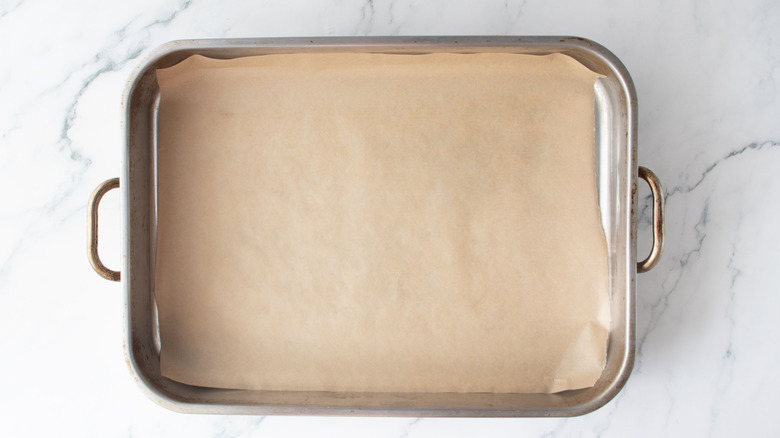 Roasting pan lined with parchment paper