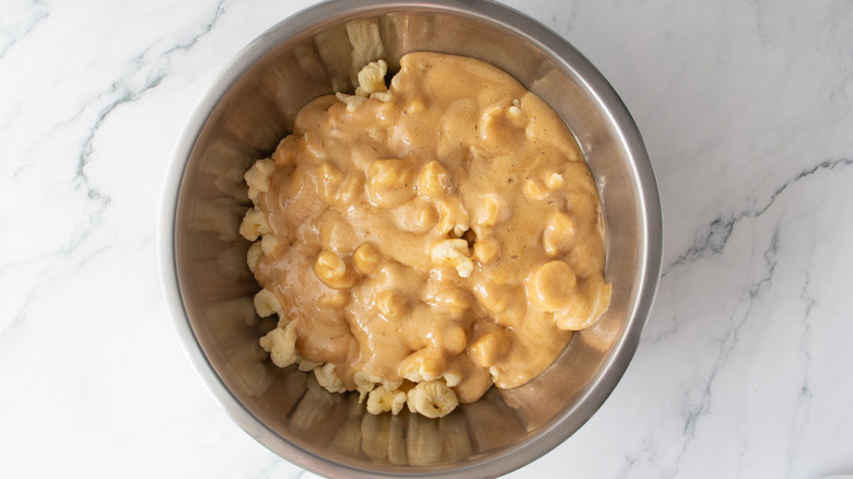 Puffcorn and caramel in bowl