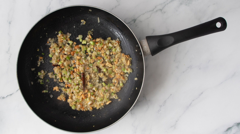 Sauteed aromatics in pan