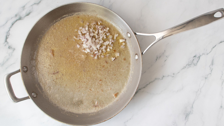 Shallot in skillet with melted butter