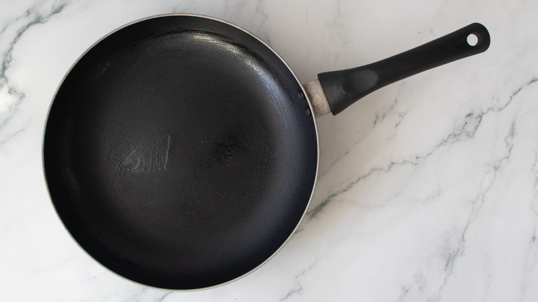 black frying pan on a kitchen counter