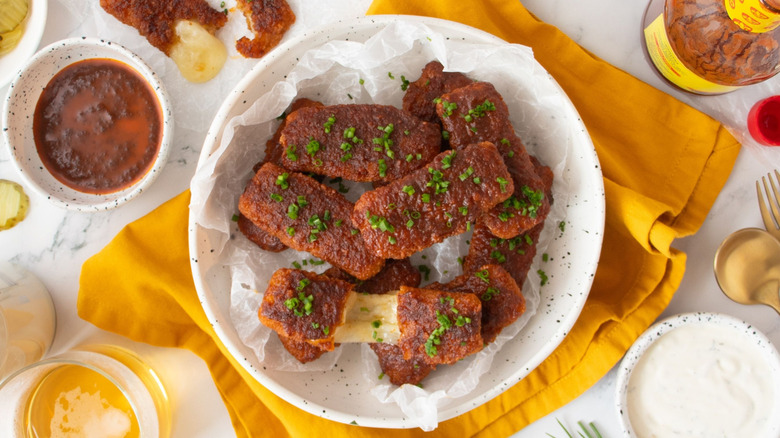 Copycat Chili's Nashville hot mozzarella sticks in bowl
