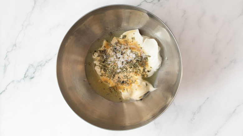 Ranch ingredients unmixed in bowl