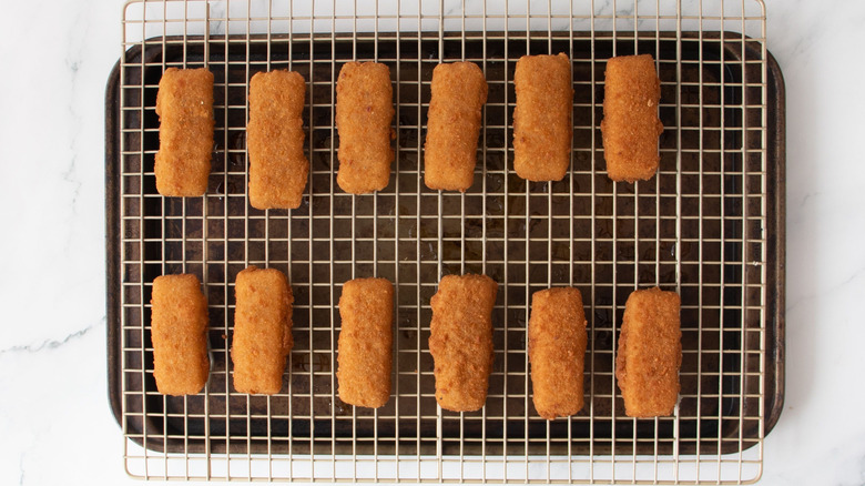 Mozzarella sticks on wire rack