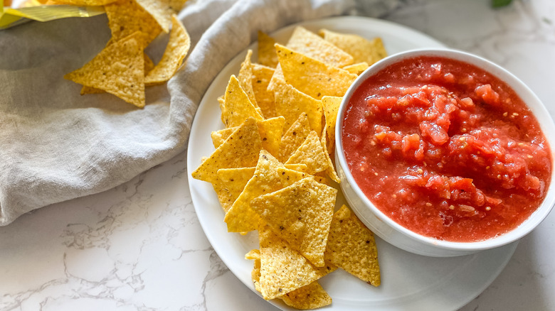 Copycat Chili's salsa in a bowl with chips