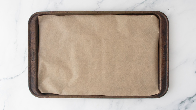 Baking sheet lined with parchment paper