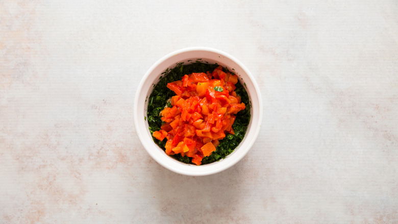 Herbs and pepper in bowl
